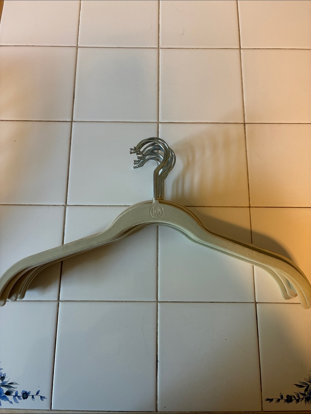 Cream Joy Mangano 15 hangers.